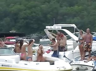 Kinky chicks show their big natural tits during an outdoor party