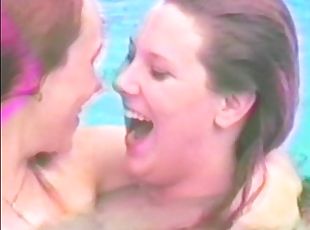 Horny lesbians are kissing in the swimming pool
