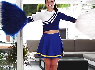 Stunning Gigi Marie poses in cheerleader uniform