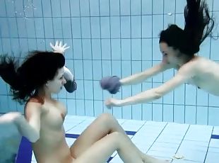 Swimming with sweet naked brunette teens