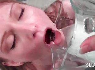 Dirty blonde slut drinking her own piss with lust