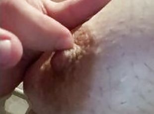 Playing with my hairy tits in the shower