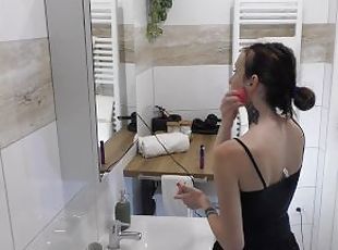 Hot sexy slim fit girl in the bathroom does make up no panties shows pussy and ass in a black skirt