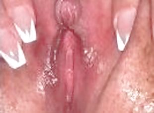 Solo wet pink Pussy close up