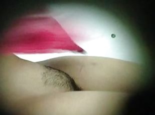 Busty brunette with trimmed pussy gets caught on a hidden cam