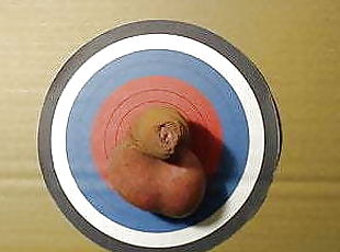 Cock used as dartboard