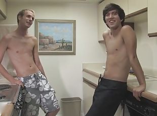 Young sexy guys having fun in the kitchen