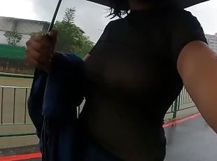 Taking a Walk in The Rain With A Sheer Top Big Boobs Reveal