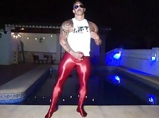 muscle man poses in ballet tights