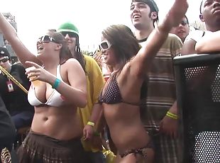 Outdoor party featuring model in bikini shaking their nice ass