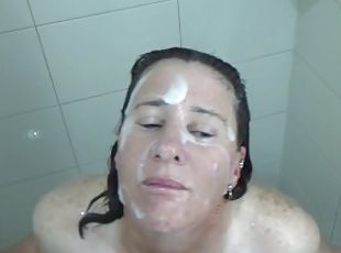 MILF gets surprised in shower & covered with big thick creamy facial