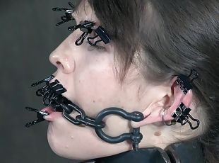 Blossom gets chained and her tits and mouth clamped and abused
