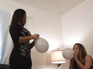 Cute Cougars have fun playing and bubbling balloons in a reality shoot