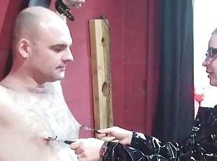 Dominatrix worships German slave in bondage