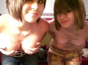 Two kinky emo sluts showing off their nice titties