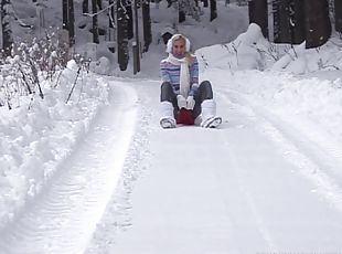 Wild blonde Yvonne toys her pussy outdoors in the snow