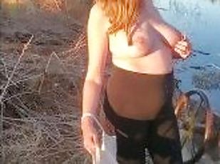 Flashing my boobs by a pond  Hot Babe gets boobs out in public