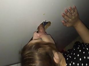 Amateur teen sucking a fat cock through a glory hole