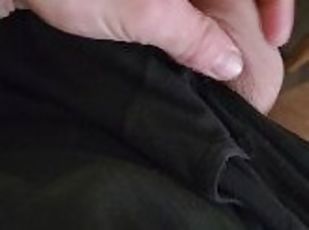Teasing my cock by playing with my balls.