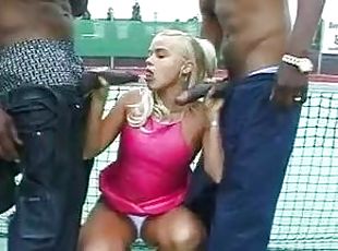 Hardcore interracial threesome on a tennis court
