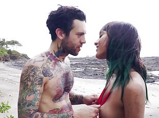 Tattooed man has a blast fucking Janice Griffith on a beach