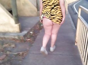 Wife shows her big ass upskirt while walking