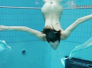 Sexy Russian filly Gazel Podvodkova fools around the pool in the nude