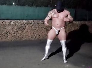 Thonged muscle man on a public street