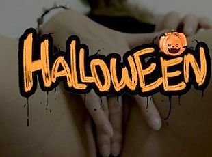 Naughty petite blonde in Halloween costume shows her pussy and pleases herself with fingers