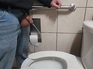 Pissing with huge balls hanging