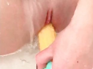 Gorgeous girl showering and fucking her pussy