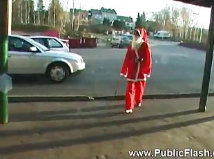 Santa girl doing a striptease on camera