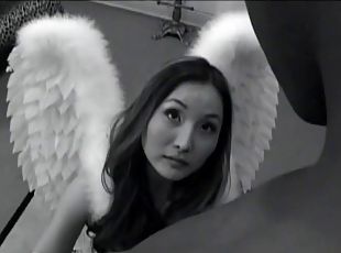 Lacey Tom sucks on a big black cock dressed as an angel