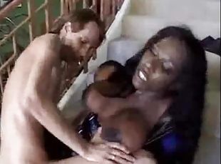 Black girl in latex takes two black cocks