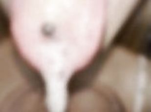 A young blondie teen is hocking and spitting a big one drool from the long big yellowish tongue