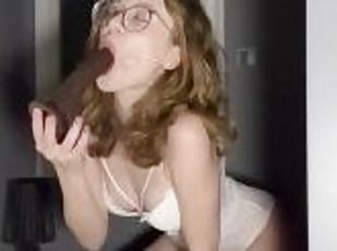 blonde in sexy lingerie sucks cock on her knees